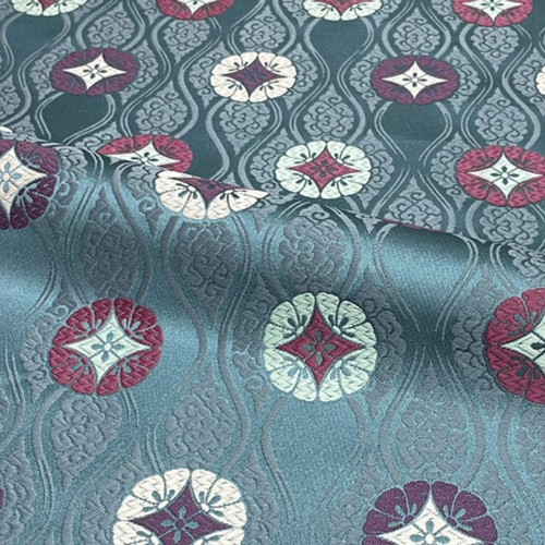 Floral Motif on Clouded Rising Waves